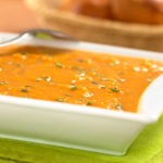 Roasted sweet potato and coconut milk soup with friend sage